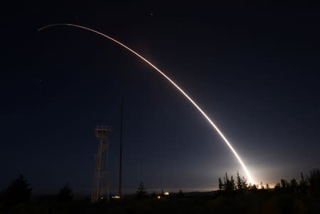 FILE PHOTO: An unarmed Minuteman III intercontinental ballistic missile launches during an operational test from Vandenberg Air Force Base California