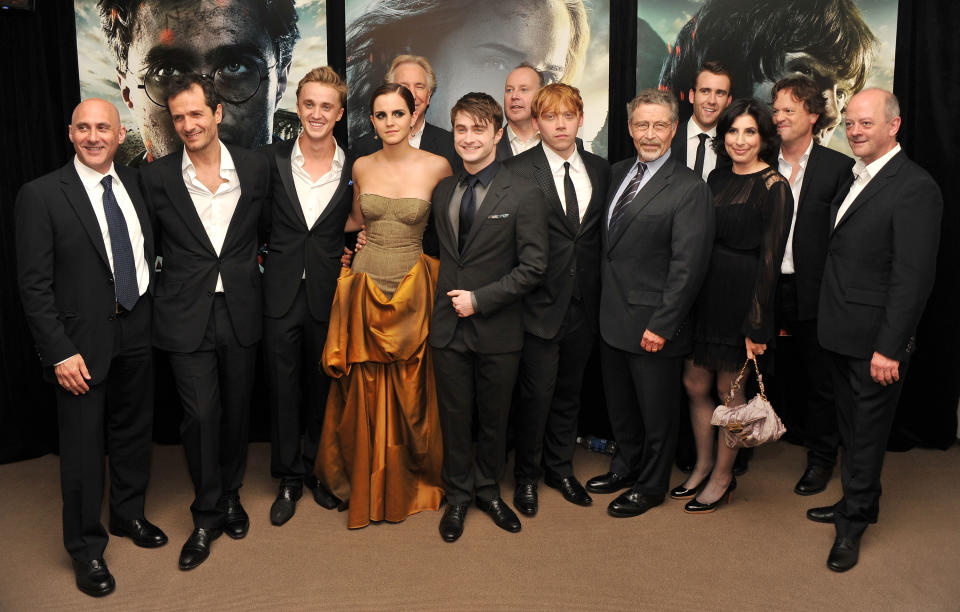 NEW YORK, NY – JULY 11: (L-R) Jeff Robinov, David Heyman, Tom Felton, Emma Watson, Alan Rickman, Daniel Radcliffe, David Yates, Rupert Grint, Barry M. Meyer, Matthew Lewis, Sue Kroll, Chris Columbus and David Barron attend the New York premiere of “Harry Potter And The Deathly Hallows: Part 2” at Avery Fisher Hall, Lincoln Center on July 11, 2011 in New York City. (Photo by Stephen Lovekin/Getty Images)