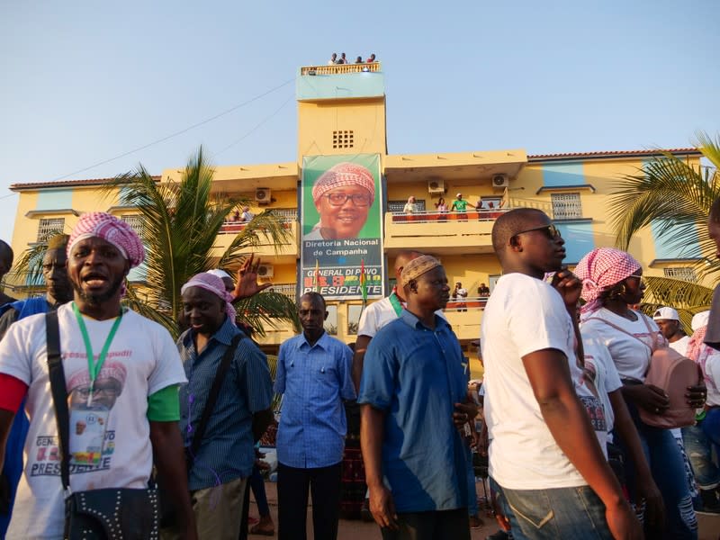 Supporters of presidential candidate Umaro Sissoko Embalo gather outside his campaign headquarters in Bissau