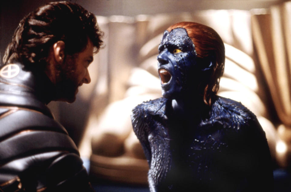 Mystique (Rebecca Romijn-Stamos) experiences the pain of a Wolverine gut punch in 'X-Men" (Photo: Everett)