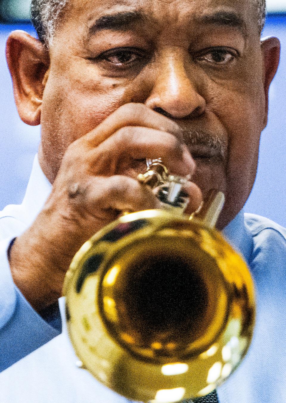 Coleman Woodson Jr. holds an instrument during his band class at Floyd Middle Magnet School.