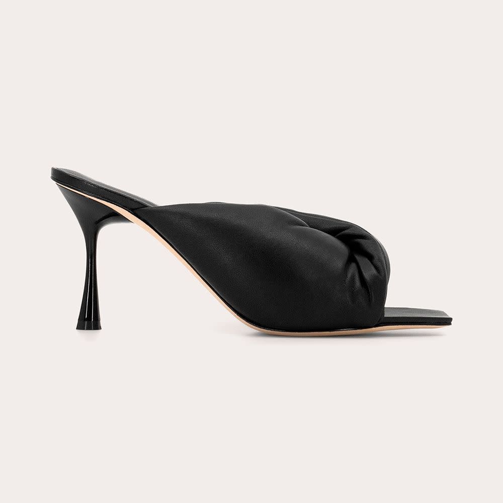 <p><a href="https://www.olivela.com/products/leather-croissant-90-heel-black" rel="nofollow noopener" target="_blank" data-ylk="slk:Shop Now;elm:context_link;itc:0;sec:content-canvas" class="link rapid-noclick-resp">Shop Now</a></p><p>Leather Croissant 90 Heel</p><p>olivela.com</p><p>$420.00</p>