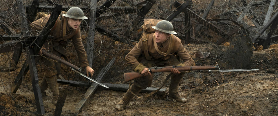 This image released by Universal Pictures shows Dean-Charles Chapman, left, and George MacKay in a scene from "1917," directed by Sam Mendes. (François Duhamel/Universal Pictures via AP)