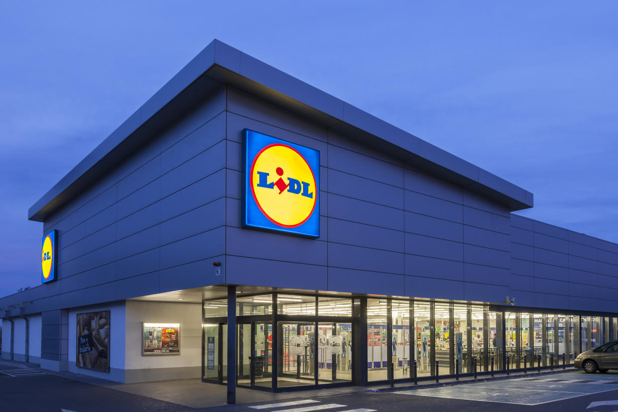 Cartagena, Spain - May 17, 2017: New Lidl supermarket building illuminated at dusk. Lidl is german discount supermarkets chain based in Neckarsulm, Germany