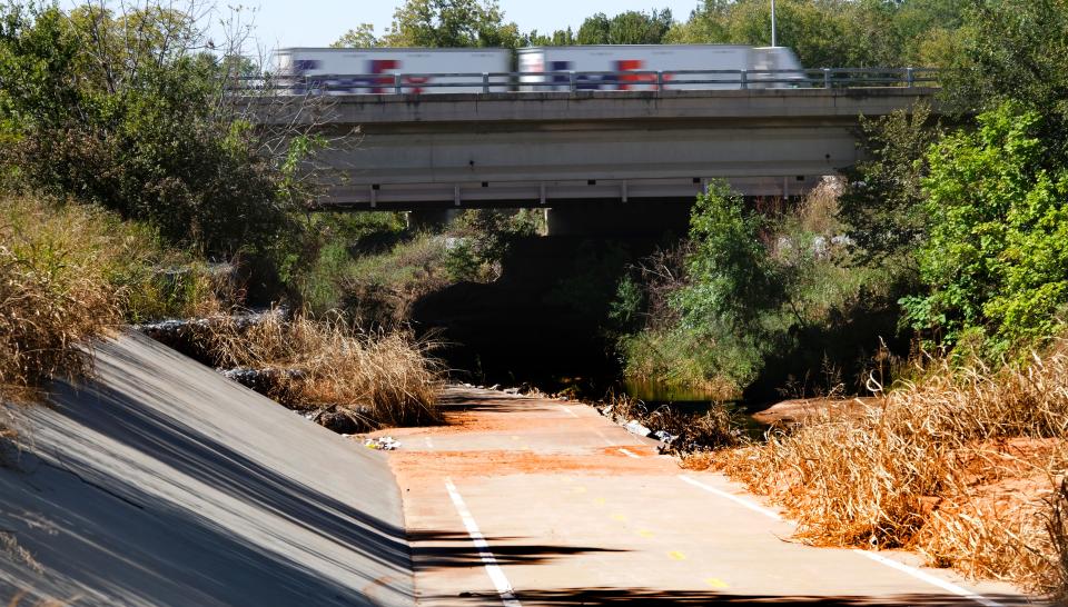 This underpass links a trail on Interstate 35's west side with Edmond's Spring Creek Trail near Arcadia Lake. Edmond is using $3 million in federal grants to expand its trail system.