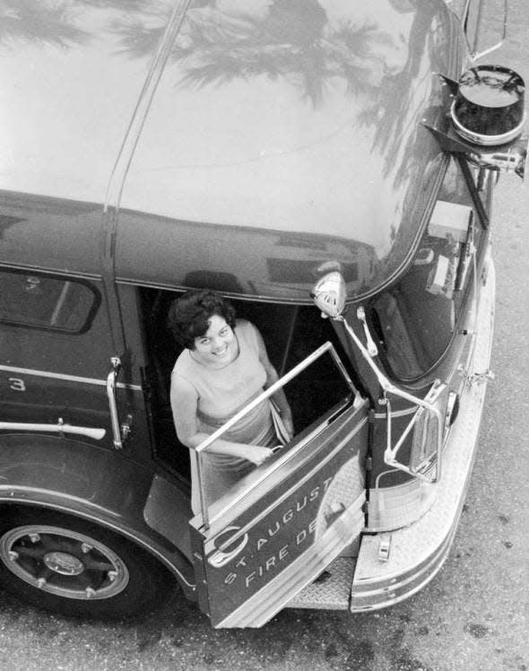 Margo Cox, now Pope, is dropped off at the old Record building in a St. Augustine fire truck after covering a city budget story in 1966.