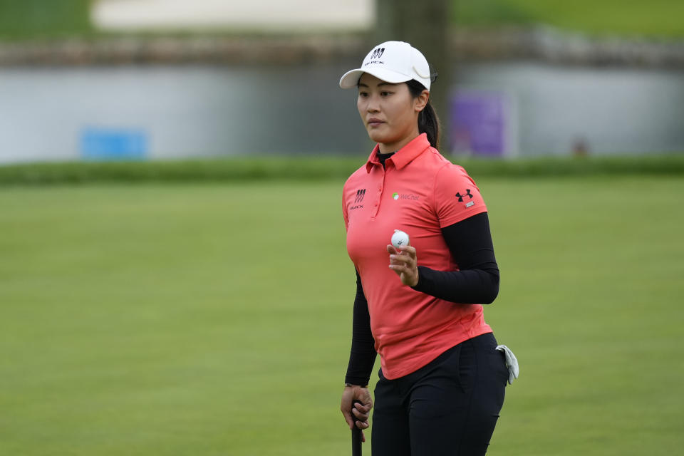 Xiyu Lin, of China, after putting in on the 18th hole during the first round of the Women's PGA Championship golf tournament, Thursday, June 22, 2023, in Springfield, N.J. (AP Photo/Matt Rourke)