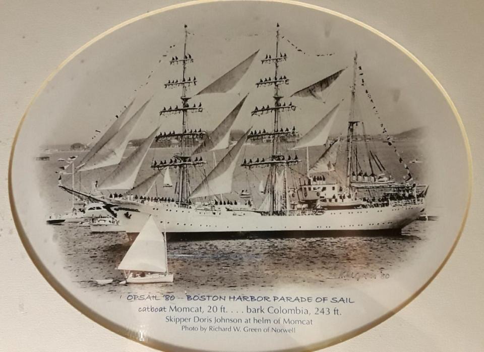 In 1980, Doris Johnson sailed her catboat Momcat a little closer than expected during the Boston Harbor Parade of Sail with the Tall Ships. Her daughter Glenna Wyman recalled: "She was  errantly sailing in the foreground of one of the Tall Ships parading past, when she was supposed to already be moored in Boston Harbor, per her special pass. I was a mortified guest aboard her boat as a man barked at her through a microphone from the OPSAIL boat: 'Go to your mooring! Go to your mooring!' as she sailed by, shouting back, 'I'm trying, I'm trying!' "