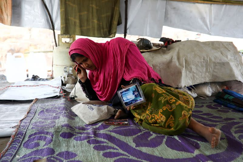 The Wider Image: 'Can't take this pain': Rohingya mother searches for son after refugee camp blaze