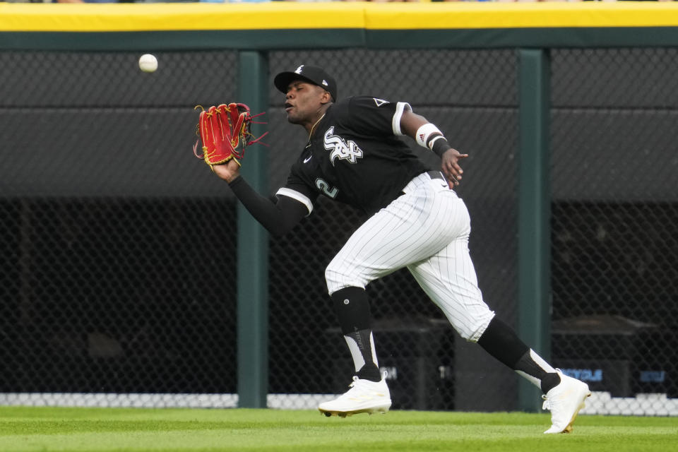 Chicago White Sox right fielder Oscar Colas catches a fly ball hit by Toronto Blue Jays' Cavan Biggio during the eighth inning in the first baseball game of a doubleheader Thursday, July 6, 2023, in Chicago. (AP Photo/Nam Y. Huh)