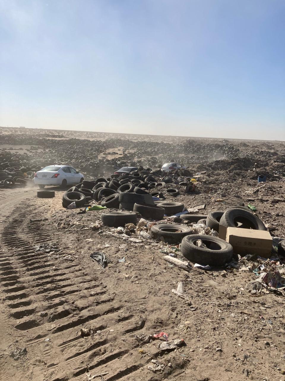 The convoy of the Third State Search Brigade crosses the dump in San Luis Rio Colorado, Sonora, on Nov. 27, 2021. The citizen groups organizing the search of missing relatives received an anonymous tip with the likely location of a clandestine burial site.