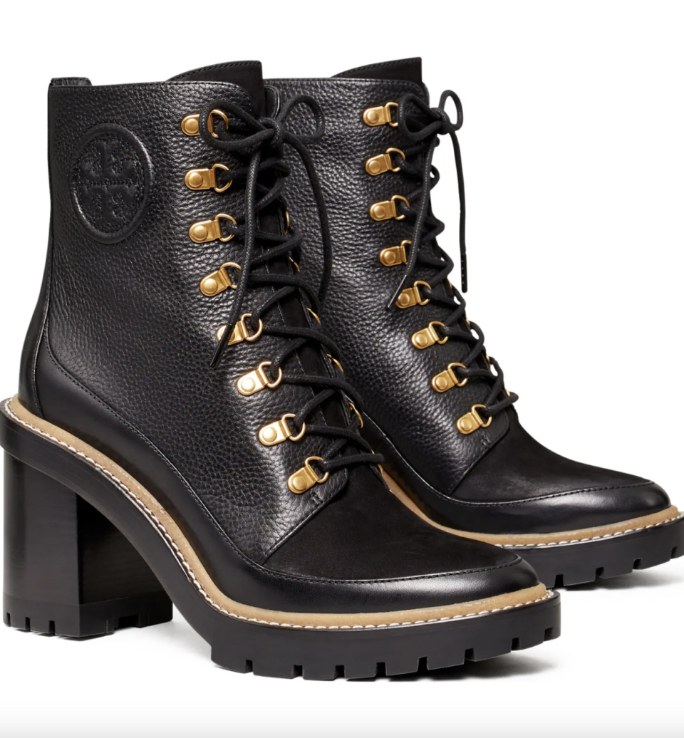 Tory Burch Miller Mixed Materials Lug Sole Boot in black leather and gold buckles (Photo via Nordstrom)