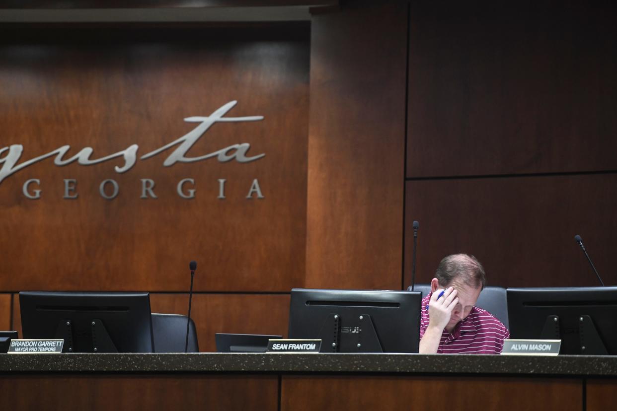 Augusta District 7 Commissioner Sean Frantom looks over the proposed budget at the Augusta Commission budget workshop in the Augusta-Richmond County Municipal Building on Thursday, Oct. 26, 2023.