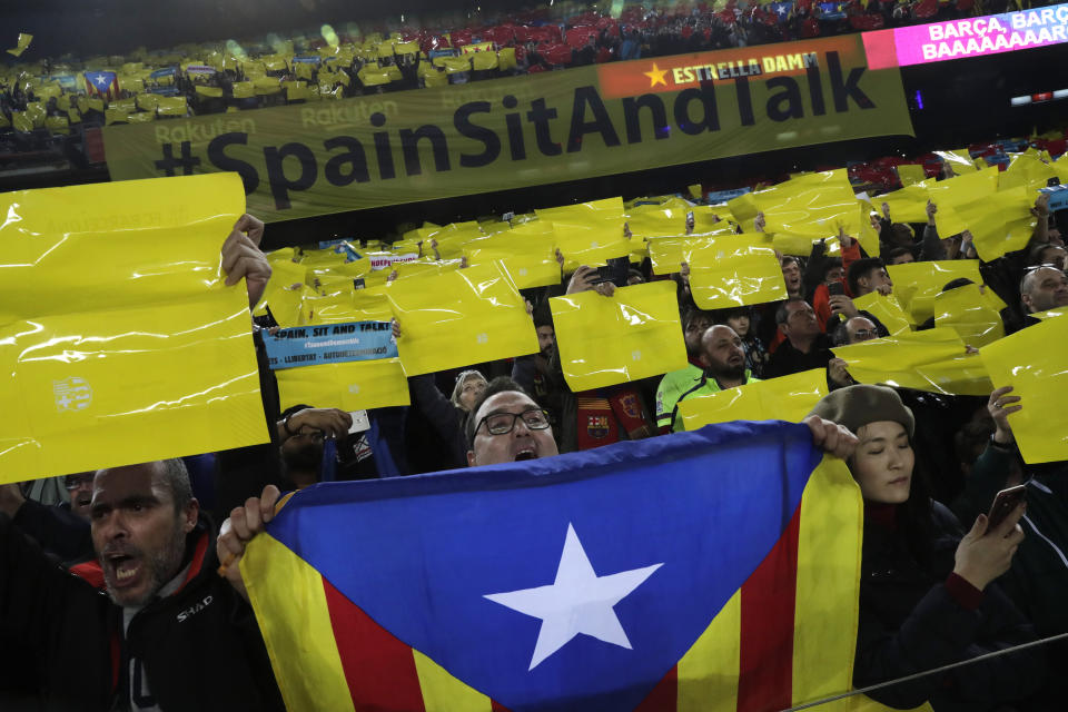 CORRECT NAME OF THE PHOTOGRAPHER - FC Barcelona's supporters hold an "estelada" or independence flag prior of a Spanish La Liga soccer match between Barcelona and Real Madrid at Camp Nou stadium in Barcelona, Spain, Wednesday, Dec. 18, 2019. Thousands of Catalan separatists are planning to protest around and inside Barcelona's Camp Nou Stadium during Wednesday's "Clasico". (AP Photo/Bernat Armangue)