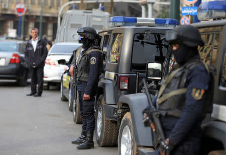 Egyptian members of the security forces stand guard during the sixth anniversary of the 2011 uprising, at Tahrir Square in Cairo, Egypt, January 25, 2017. REUTERS/Mohamed Abd El Ghany