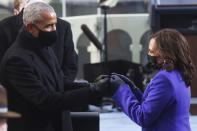 <p>Obama and Harris exchange a joyful glance as they say a masked hello. </p>