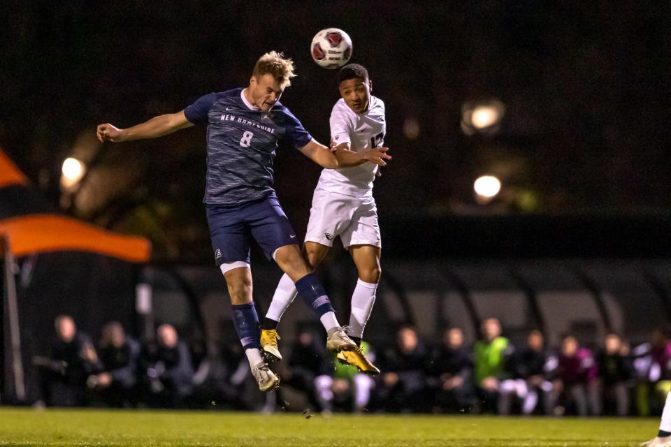 Johann von Knebel, left, of the 16th-seeded University of New Hampshire heads the battle against host No. 1 Oregon State in an NCAA men's soccer tournament round of 16 match Sunday, Nov. 28, 2021. OSU defeated UNH, 1-0, to advance to the quarterfinal round.