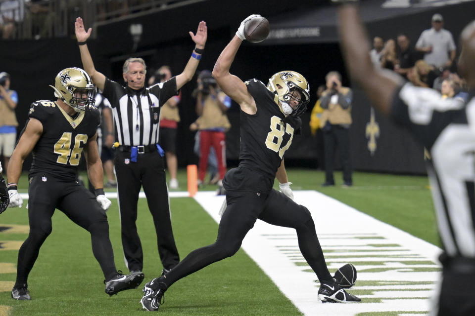 New Orleans Saints tight end Foster Moreau (87) celebrates a touchdown during the first half of an NFL football game against the Carolina Panthers, Sunday, Sept. 8, 2024, in New Orleans. (AP Photo/Matthew Hinton)