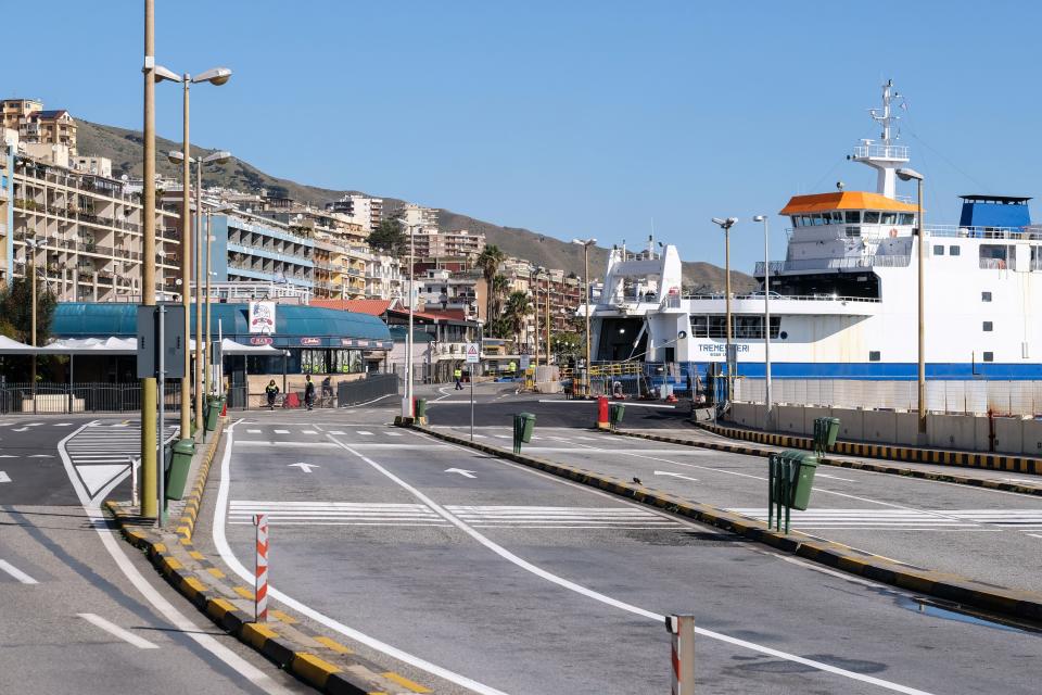 A deserted car boarding area is pictured at the ferry terminal in Messina, Sicily, on March 10, 2020. (Credit: Giovanni Isolino/AFP)