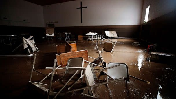 PHOTO: Chairs and pews lie in mud at Baptist Bible Church, July 14, 2022 in Whitewood, Va., following a flash flood. (Michael Clubb/AP)
