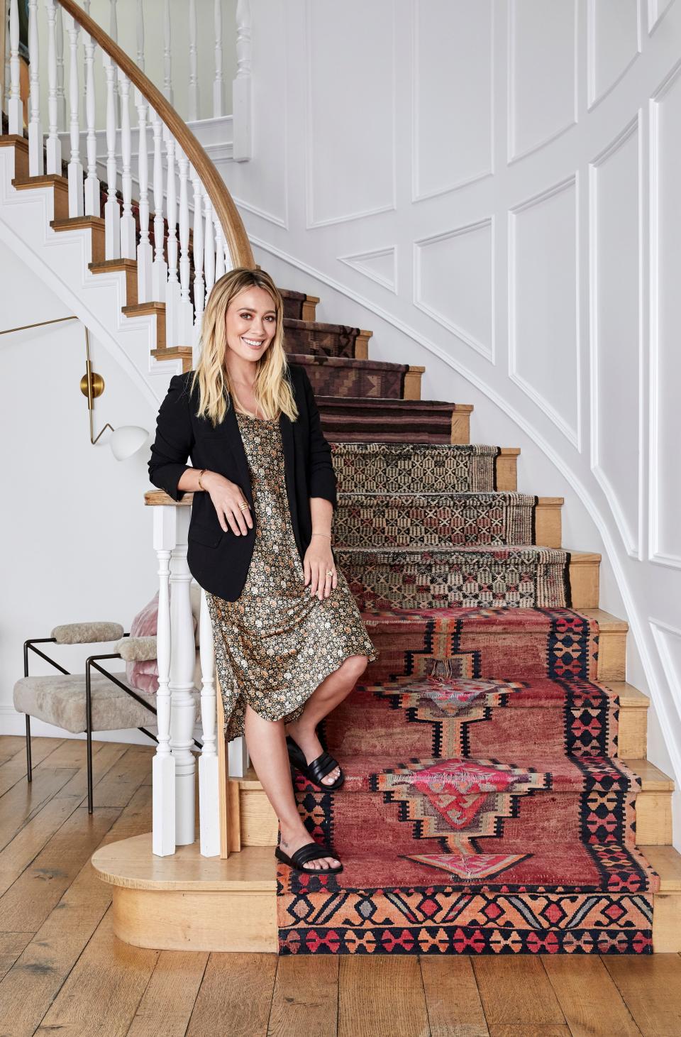 Actor-musician Hilary Duff worked with her team from Studio Life/Style to pick the perfect trio of rugs to line the foyer stairway in her Beverly Hills home, an idea she had favorited on Pinterest. From Woven in West Hollywood—a store Duff says, “I lose all my money at”—the vibrant rugs were cut and then sewn together into a singular design. “To lay out the rugs on each step, deciding where to make the cuts was…very, very scary.”