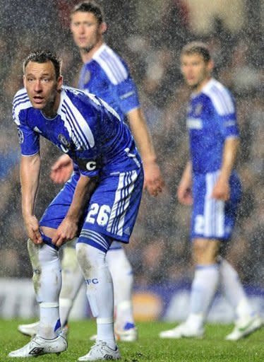 Chelsea's English defender John Terry (L) looks on during the UEFA Champions League semi-final first leg football match vs Barcelona at Stamford Bridge in London. Chelsea won 1-0