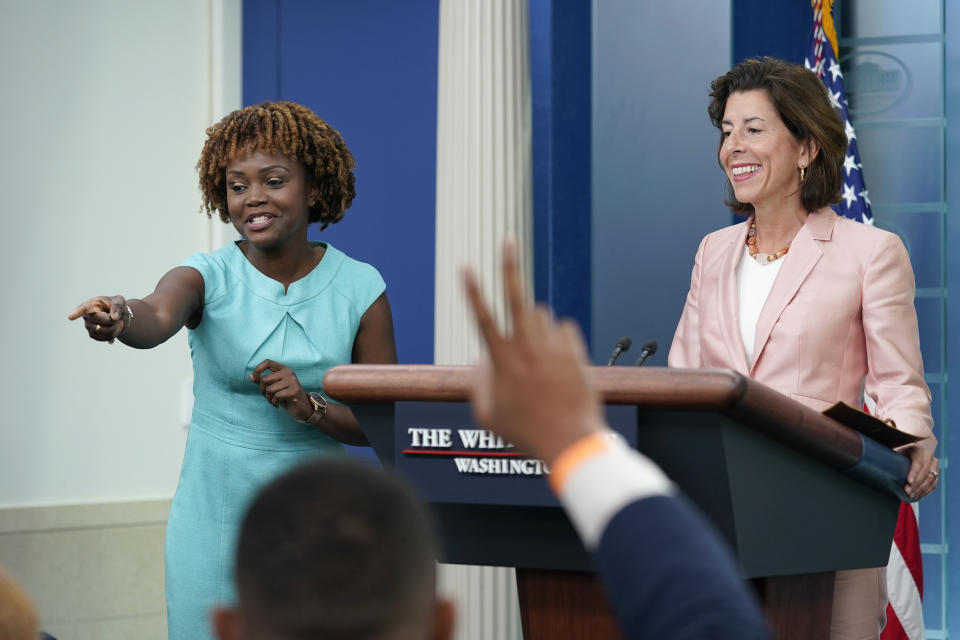 White House press secretary Karine Jean-Pierre, left, calls on a reporter during a briefing with Commerce Secretary Gina Raimondo, right, during the daily briefing at the White House in Washington, Tuesday, Sept. 6, 2022. (AP Photo/Susan Walsh)