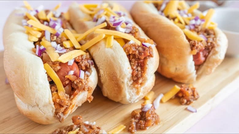 hot dogs with chili on top
