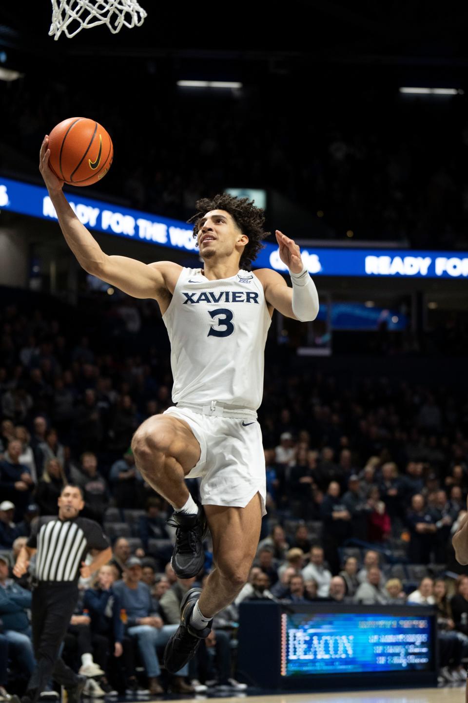 Xavier Musketeers guard Colby Jones (3) goes up for a layup in the first half of the NCAA basketball game at the Cintas Center in Cincinnati on Wednesday, Nov. 30, 2022. 
