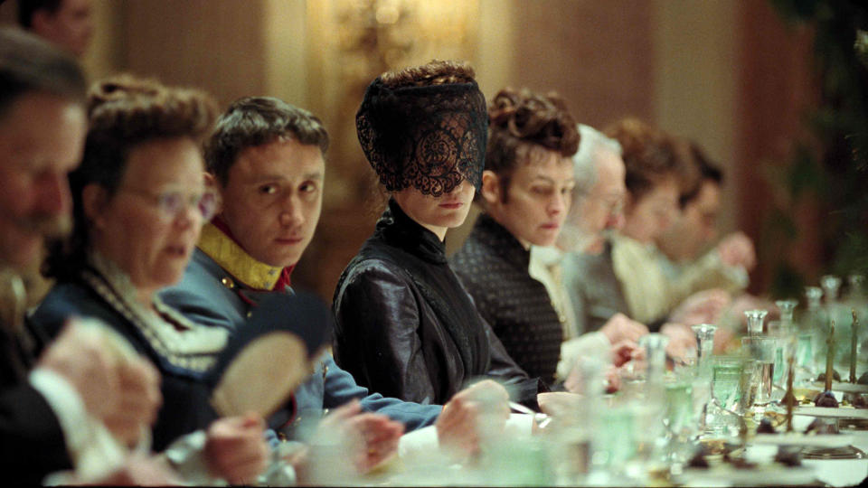 This image released by IFC Films shows Vicky Krieps as Empress Elisabeth, center, in a scene from "Corsage." (IFC Films via AP)
