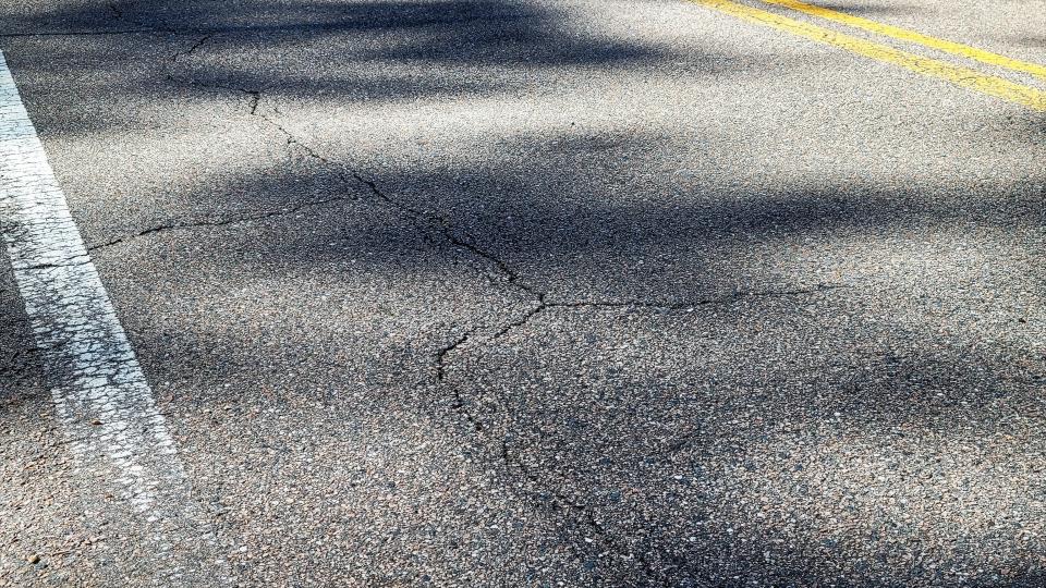 Cracks can be seen in Ortega Boulevard here in front of Stockton Park.