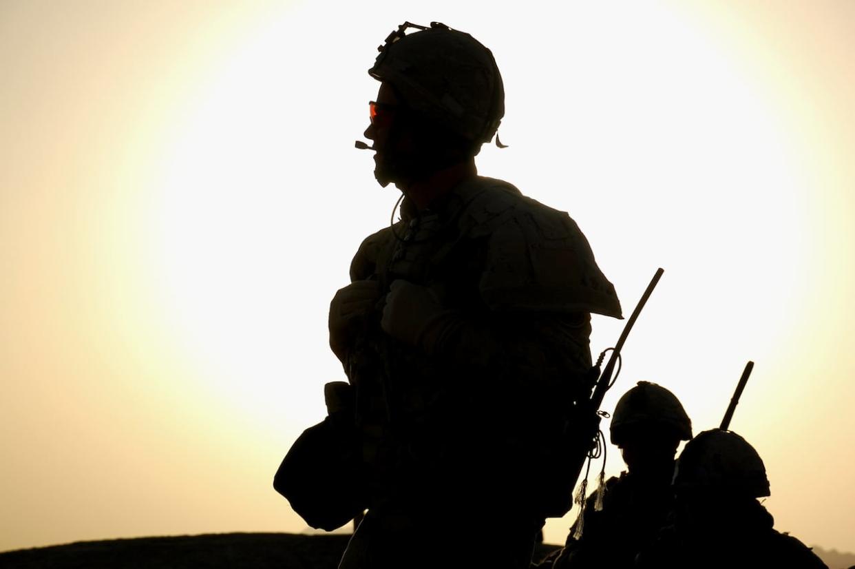 A Canadian soldier on a dawn patrol southwest of Kandahar City in March 2010. (Murray Brewster/The Canadian Press - image credit)