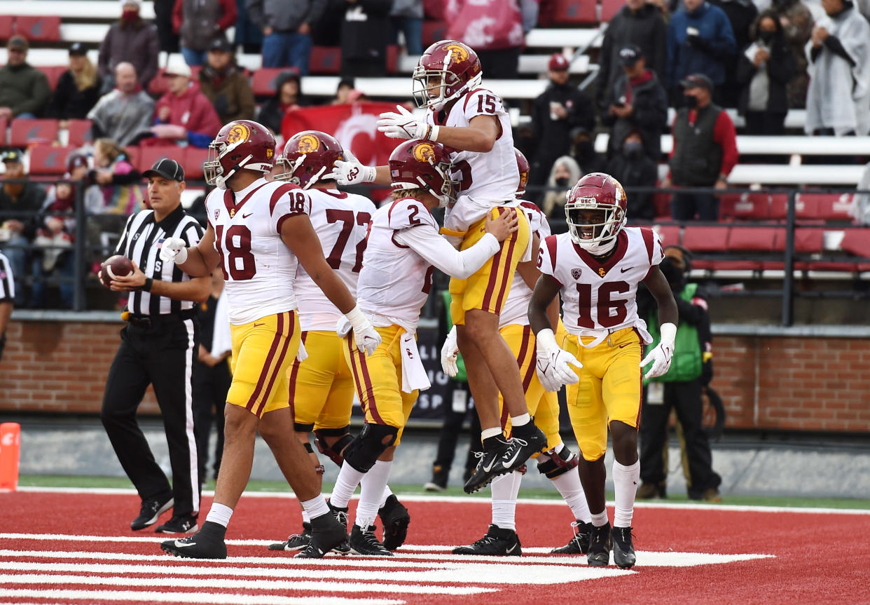 USC quarterback Jaxson Dart (2) and wide receiver Drake London (15) celebrate a touchdown against Washington State on Saturday. (James Snook-USA TODAY Sports)