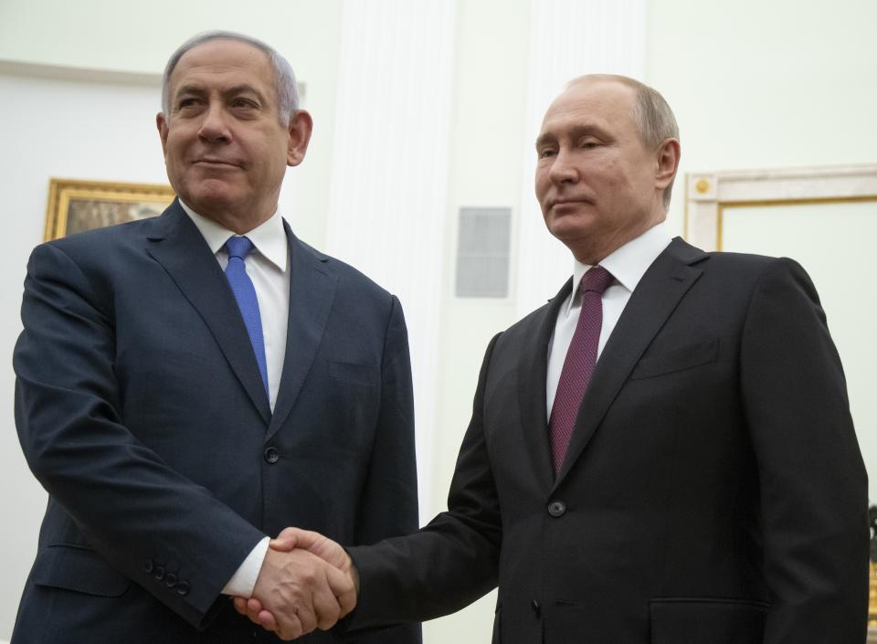 Russian President Vladimir Putin, right, shakes hands with Israeli Prime Minister Benjamin Netanyahu during their meeting in the Kremlin in Moscow, Russia, Thursday, April 4, 2019. (AP Photo/Alexander Zemlianichenko, Pool)