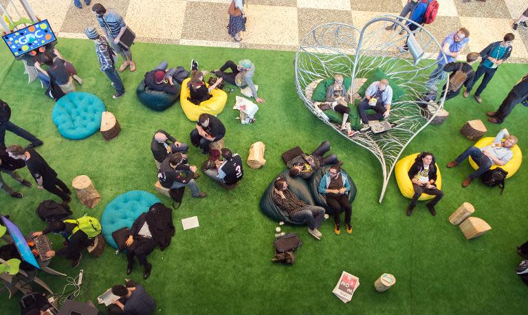 People sleep, talk and relax in this overhead view of the Game Developers Conference in San Francisco, California on March 3, 2015