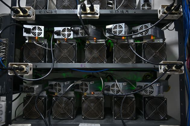 View of computers used to produce Bitcoins at the mining showroom of the Doctorminer company in Caracas on August 18, 2021. - In a Venezuela with ridiculously low electricity costs, mining cryptocurrencies has become a very profitable business, albeit a target for extortion. (Photo by Federico PARRA / AFP) (Photo by FEDERICO PARRA/AFP via Getty Images) (Photo: FEDERICO PARRA via Getty Images)