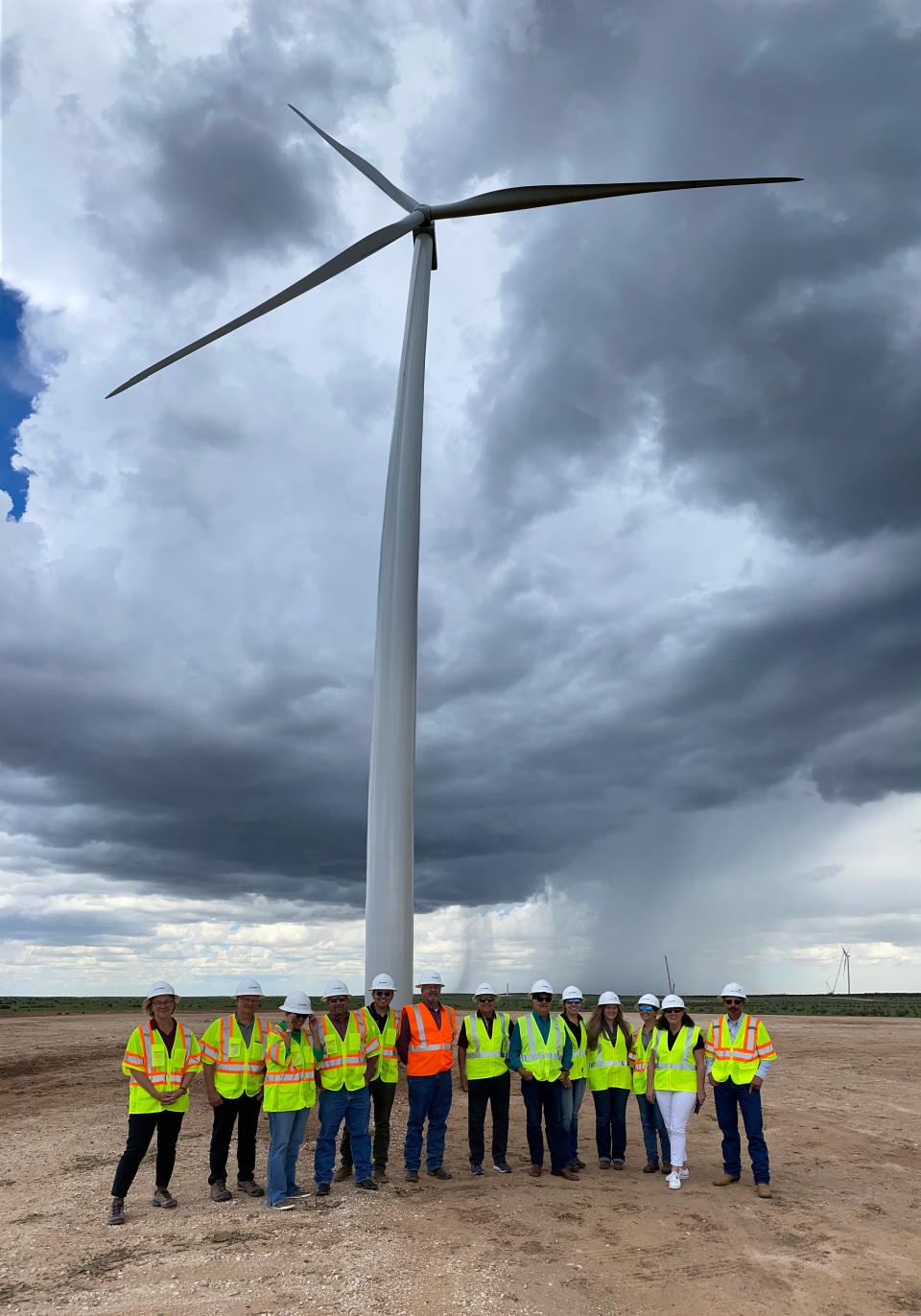 A group from New Mexico State University, including NMSU Chancellor Dan Arvizu, second from left, visited the Corona Range and Livestock Research Center to get a glimpse of a wind farm being constructed by Pattern Energy as part of a partnership with the university.