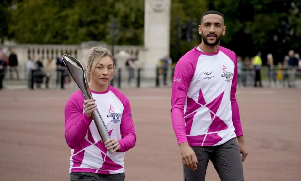 Lauren Price with the baton for the 2022 Commonwealth Games, which are in Birmingham.