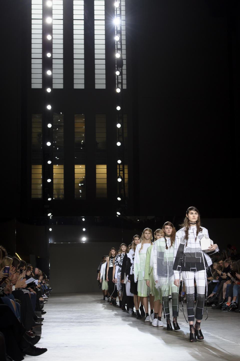 Models wear designs created by Louise Alsop part of Fashion East during London Fashion Week Autumn/Winter 2014, at the Tate Modern in central London, Tuesday, Feb. 18, 2014. (Photo by Jonathan Short/Invision/AP)