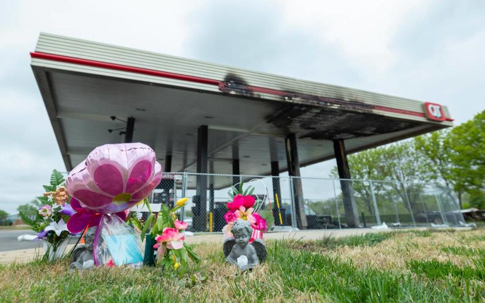 A makeshift memorial has emerged outside of a QuikTrip in Derby where a 3-year old girl was killed, and her mother seriously injured, on Monday when an out-of-control driver hit a vehicle that was filling up with gas.