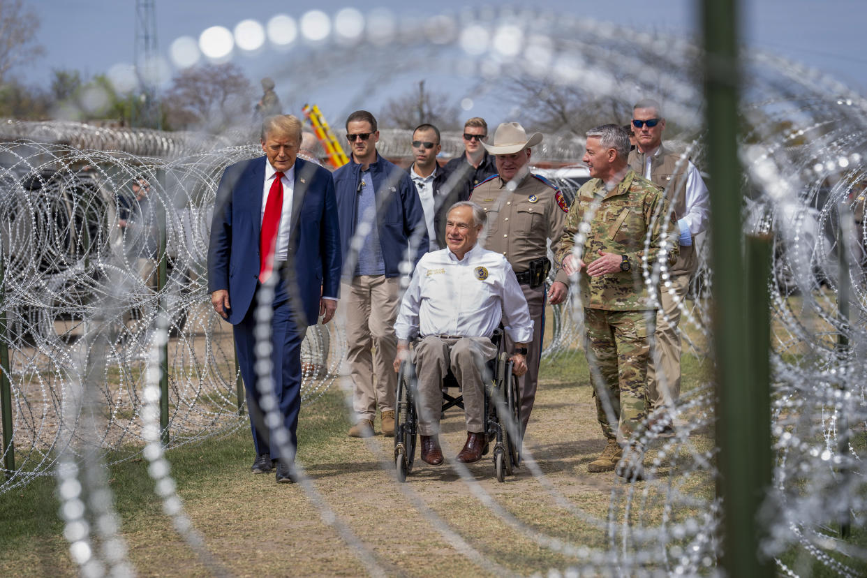 Donald Trump and Gov. Greg Abbott of Texas at the U.S. border with Mexico, in Eagle Pass, Texas on Feb. 28, 2024.(Doug Mills/The New York Times)