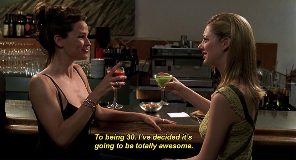 Jennifer Garner as Jenna and Judy Greer as Lucy drink at a bar in "13 Going on 30"