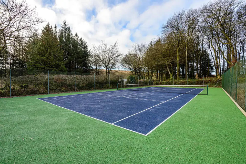 airbnbs with tennis courts in the uk and beyond