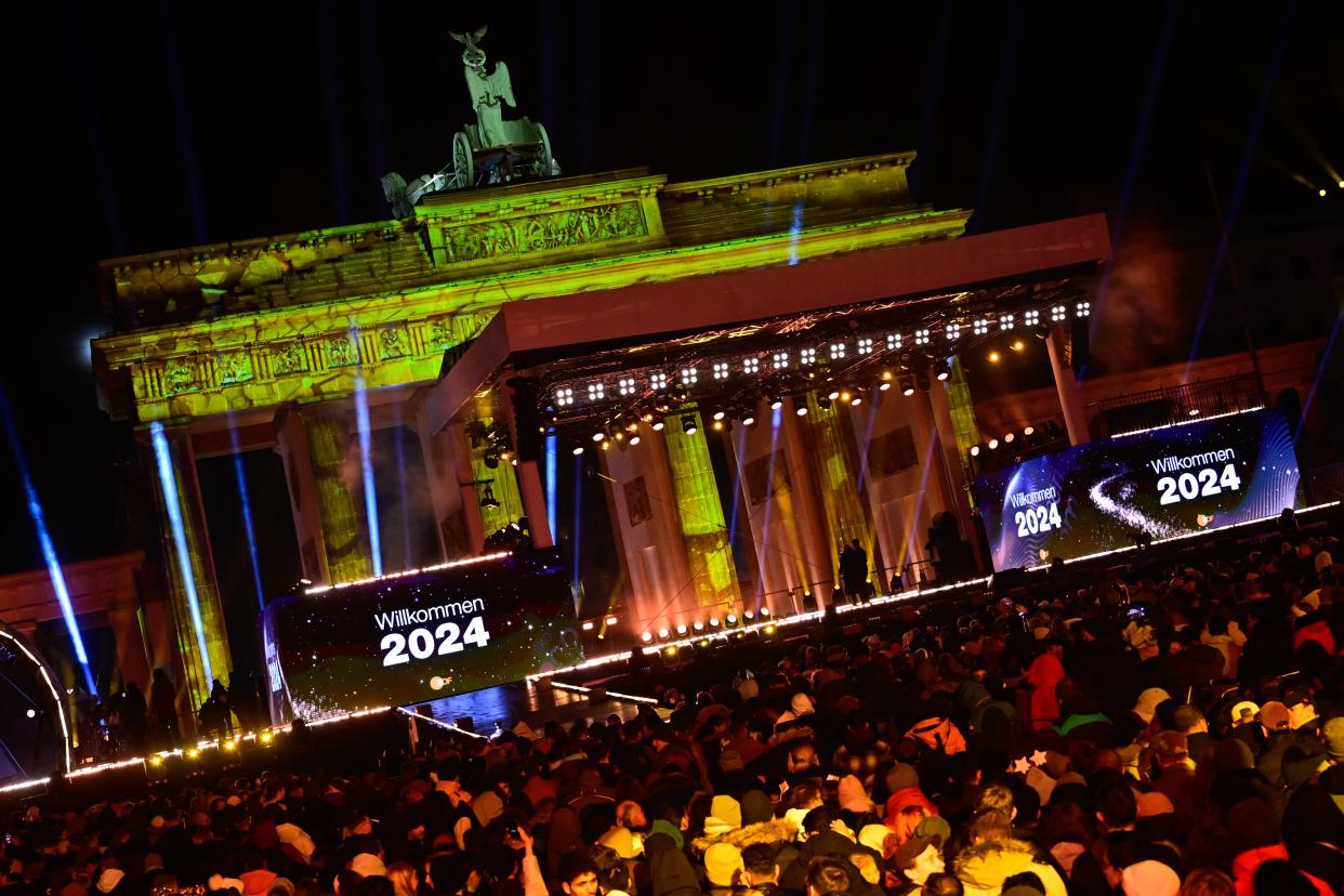 The New Year party in front of the landmark Brandenburg Gate in Berlin (AFP via Getty Images)