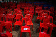 A placard of the Pheu Thai Party is seen on a chair after an election campaign in Ubon Ratchathani Province, Thailand, February 18, 2019. REUTERS/Athit Perawongmetha