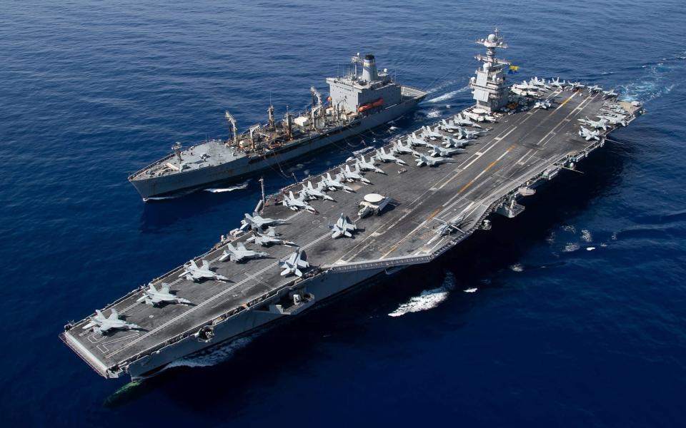 The Gerald R. Ford, the world's biggest aircraft carrier, sails alongside USNS Laramie during a fuelling-at-sea in the eastern Mediterranean.