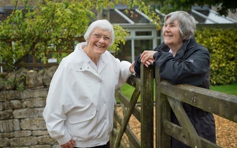 Brenda Taylor, in the black jacket, who has lived in the village for 15 years share a common ancester with Sheila Truslove who has been in the village for 63 years - Credit: David Rose