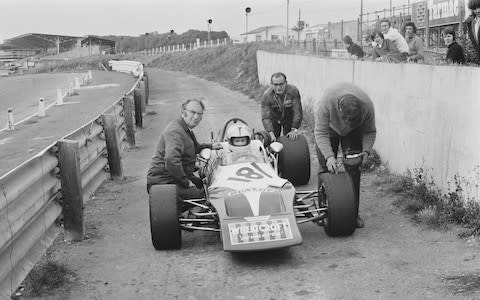 British racing driver Roger Williamson (1948 - 1973) with his backer Tom Wheatcroft (1922 - 2009, left), UK, 15th September 1971. (Photo by Norman Quicke/Daily Express/Getty Images) - Credit: Norman Quicke/Hulton Archive