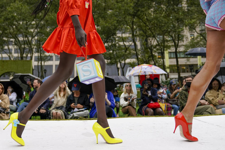 The Moschino collection is modeled during New York Fashion Week, Thursday, Sept. 9, 2021. (AP Photo/Mary Altaffer)