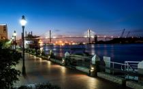 <p>Couples looking for an urban escape can take a romantic stroll along Savannahs River Street. The historic waterfront path is constructed from cobblestone thats over 200 years old. The street is chock full of cute restaurants, bars, galleries and shops and offers spectacular views of docking cargo ships. </p>